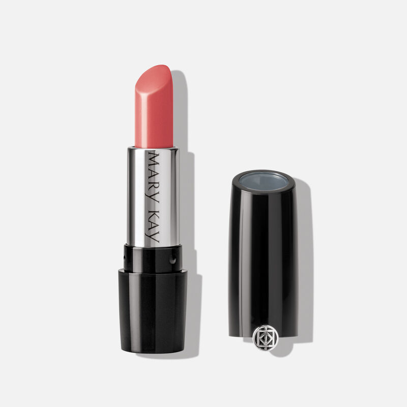 An open tube of Mary Kay Gel Semi-Shine Lipstick in the shade Sunset Peach.